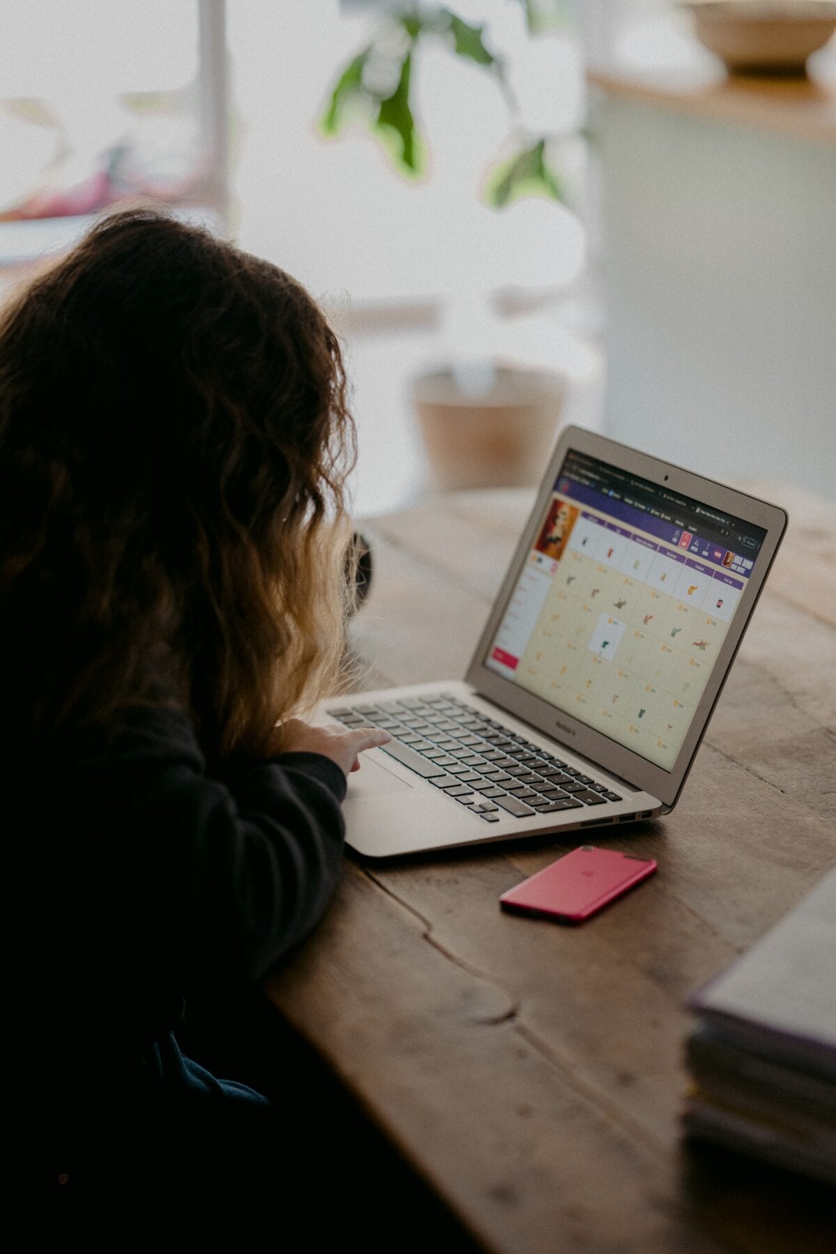 woman working on laptop from home